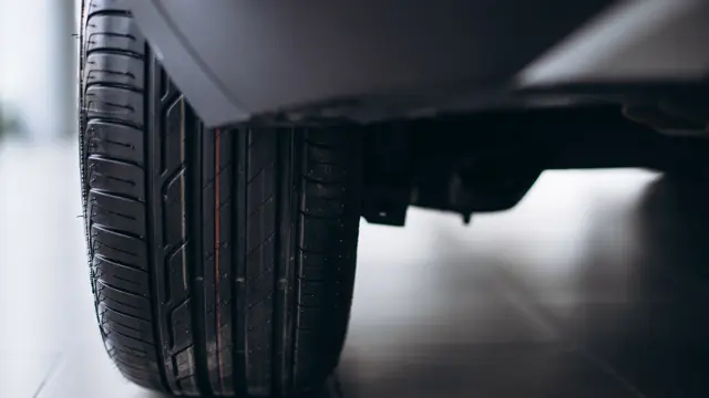 Close-up of a new tyre fitted to a vehicle wheel