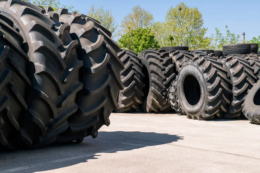 Stacks of new industrial tyres in stock